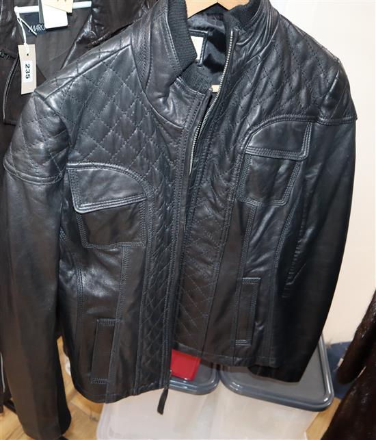 A ladys Michael Kors leather jacket, size L.